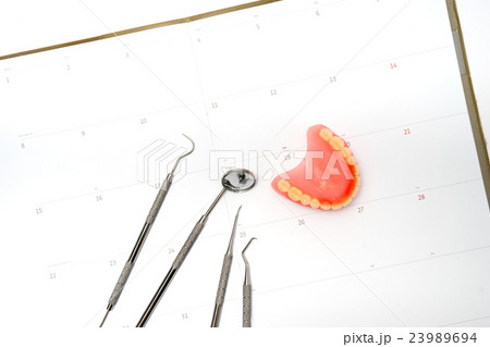 toothbrush and toothpaste from top view 23989694
