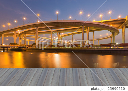 Twilight over Highway interchanged river front 23990610
