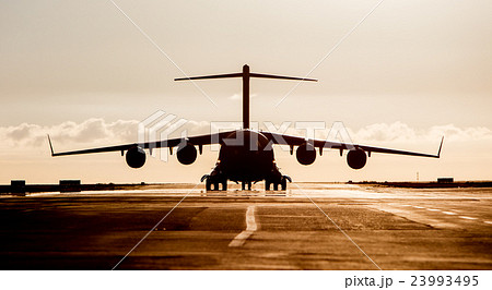 Large military cargo plane silhouette 23993495