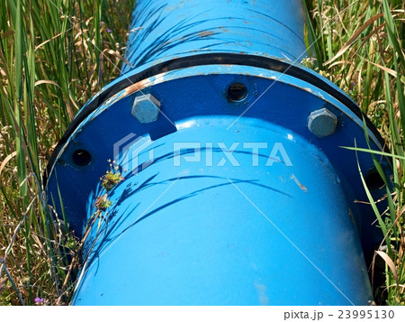 Repaired water pipes with blue flanges and screws Repaired water pipes with blue flanges and screws 23995130
