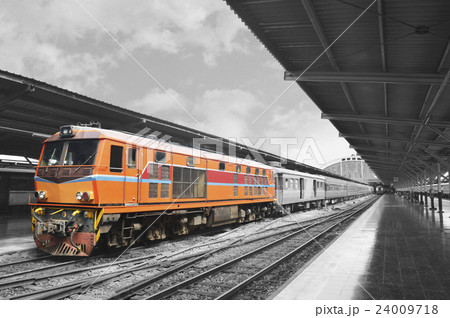 Orange train, black and white background 24009718