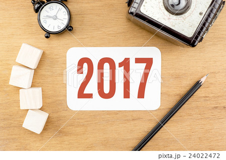 Red 2017 New year number on Wooden Table Red 2017 New year number on Wooden Table 24022472