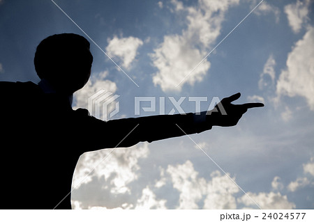 Silhouette of businessman with Go gesture with sky Silhouette of businessman with Go gesture with sky 24024577
