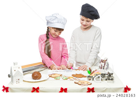 Children making christmas cookies Children making christmas cookies 24028163