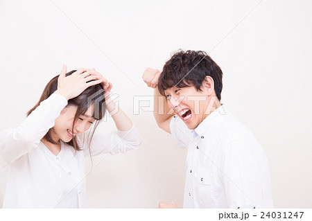 男女喧嘩イメージの写真素材