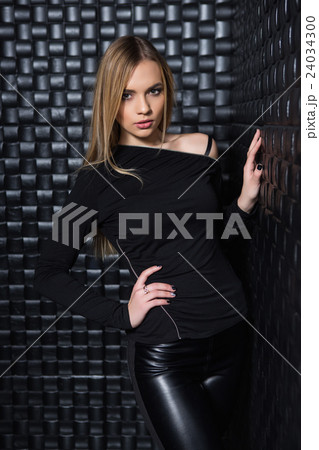 Portrait of cute young woman 24034300