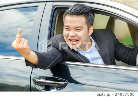 Asian young man driving a car 24037600