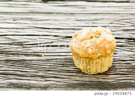 Banana cake on wood background. Banana cake on wood background. 24039873