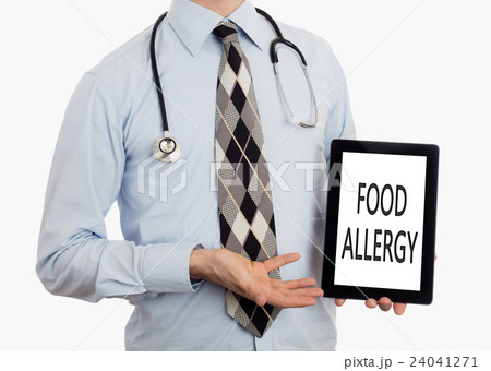 Doctor holding tablet - Food allergy Doctor holding tablet - Food allergy 24041271