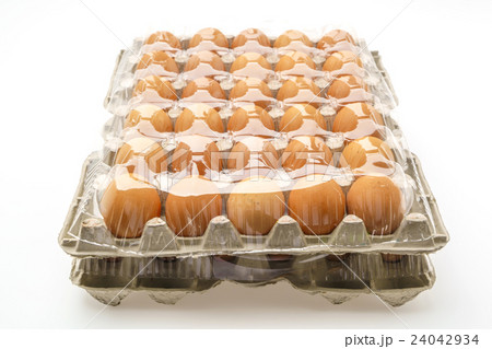 Fresh eggs in package on White Background . 24042934