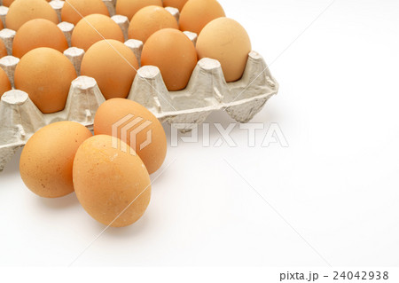Fresh eggs in package on White Background . 24042938