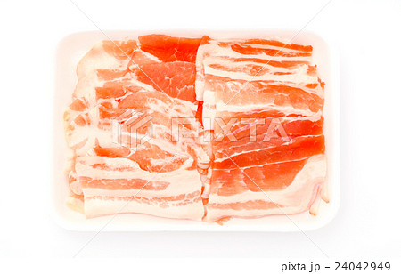 Slide of raw pork on white background . 24042949