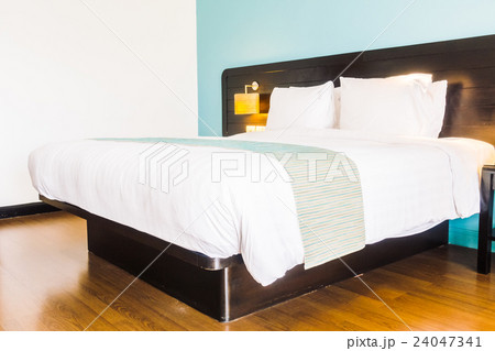 White pillow on bed White pillow on bed 24047341