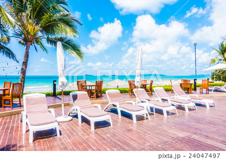 Umbrella and chair Umbrella and chair 24047497