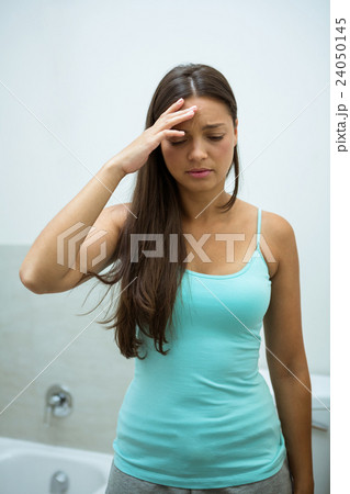 Young woman getting a headache Young woman getting a headache 24050145