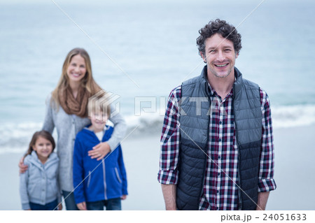 Father with mother and children at beach Father with mother and children at beach 24051633
