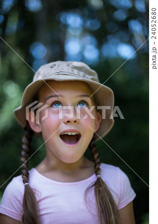 Surprised girl looking up Surprised girl looking up 24052680