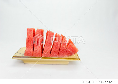 Fresh slices of watermelon on background Fresh slices of watermelon on background 24055841