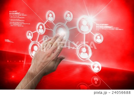 Hand touching interface on red screen 24056688