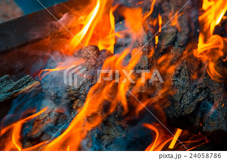 Beautiful burning fire flame background with smoke Beautiful burning fire flame background with smoke 24058786