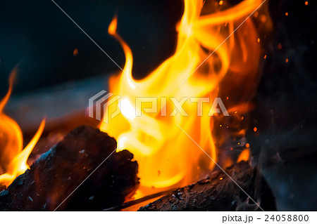 Beautiful burning fire flame background and coals Beautiful burning fire flame background and coals 24058800