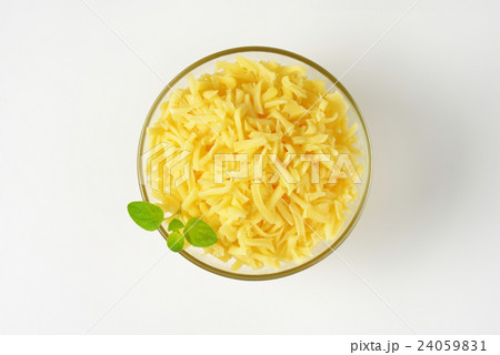 bowl of grated cheese 24059831