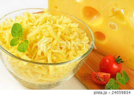 bowl of grated cheese bowl of grated cheese 24059834
