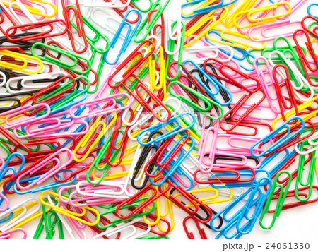 Pile of colorful paper clip on white background Pile of colorful paper clip on white background 24061330