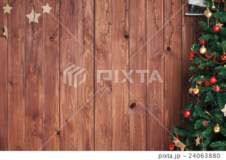 Christmas fir tree on wooden background 24063880