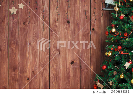 Christmas tree on wooden background 24063881
