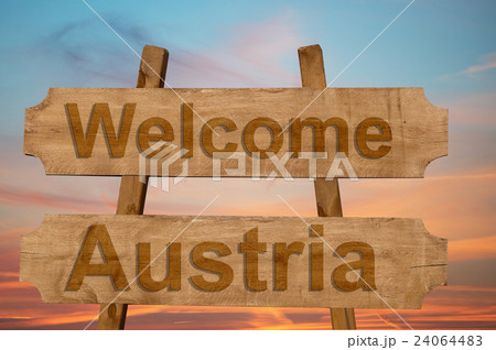 Welcome to  Austria sing on wood background 24064483