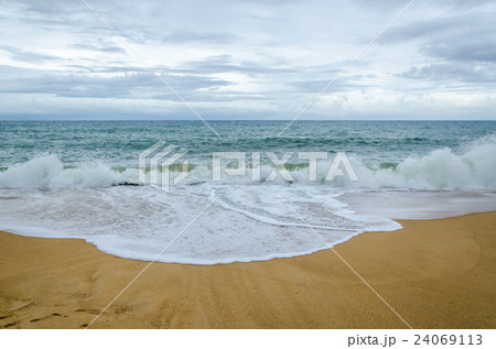 Cloudy Beach and Wave 24069113
