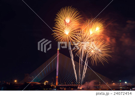 Fireworks under the bridge at night Fireworks under the bridge at night 24072454