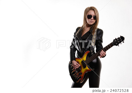 Sexy blonde girl in sunglasses , playing guitar Sexy blonde girl in sunglasses , playing guitar 24072528