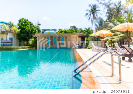 Luxury swimming pool with ladder 24078911