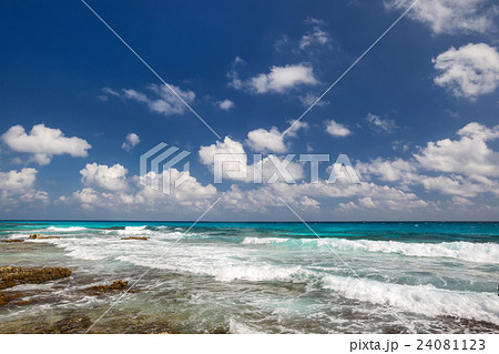 Ocean with waves and rocks on beach Ocean with waves and rocks on beach 24081123