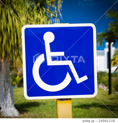 Blue handicapped sign with wheelchair 24081216