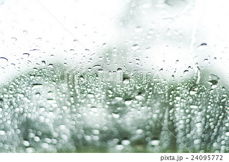 rain or water drops on a window glass 24095772