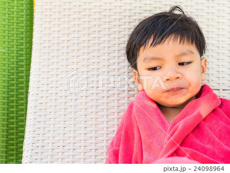 Wet Asian Baby swimmer on a beach chair 24098964