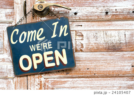 Come In We're Open on the wooden door Come In We're Open on the wooden door 24105407