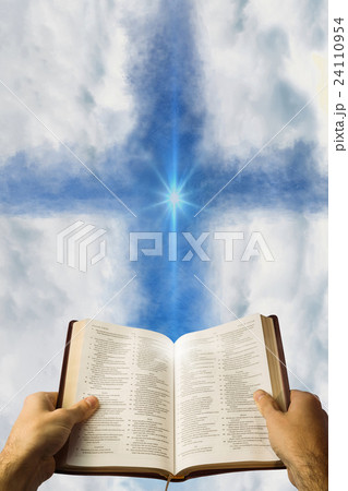 Composite image of man holding a holy bible Composite image of man holding a holy bible 24110954