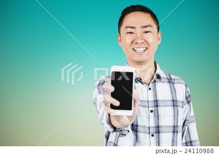 Composite image of portrait of happy man showing smart phone Composite image of portrait of happy man showing smart phone 24110988