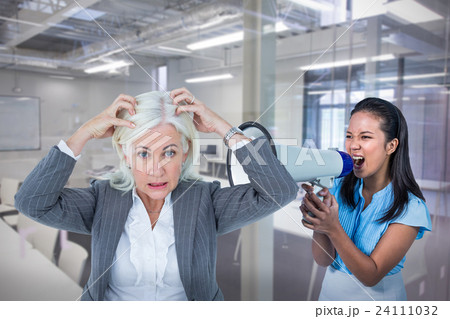 Composite image of portrait of stressed businesswoman with hands on head 24111032