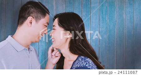Composite image of loving man adoring happy woman 24111087