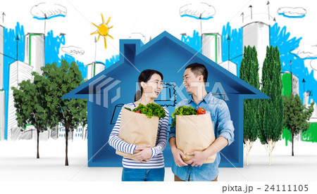 Composite image of couple looking at each other while holding grocery bags Composite image of couple looking at each other while holding grocery bags 24111105