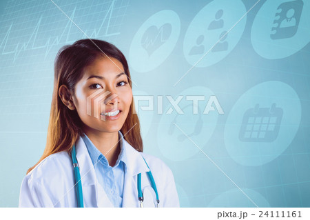 Composite image of asian doctor with stethoscope looking at camera 24111161