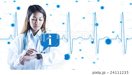 Composite image of asian doctor using her smart watch Composite image of asian doctor using her smart watch 24111235