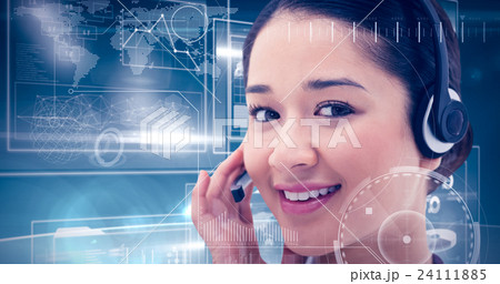 Composite image of close up of a smiling operator posing with a headset 24111885