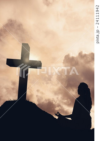 Composite image of businesswoman sitting in lotus pose 24111942