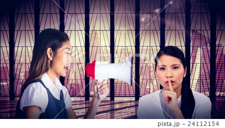 Composite image of serious businesswoman asking for silence Composite image of serious businesswoman asking for silence 24112154